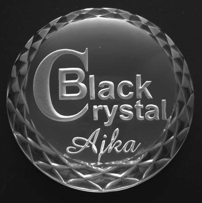 Black Crystal logo on glass
